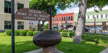 Seguin's world's largest pecan monument in a park.