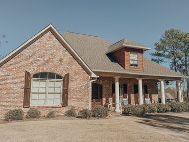 a photo of a house with a finished roof