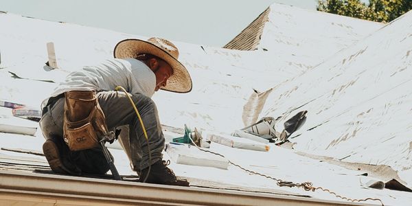 a construction worker on a roof