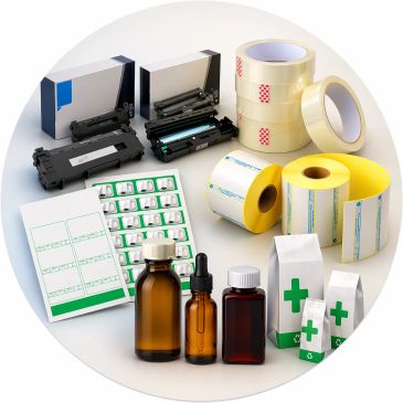 Various medical and packaging supplies including bottles, tape, and labels.