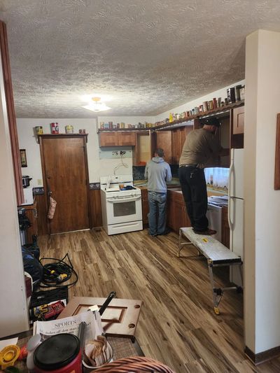 A deck contractor installing a new deck on a Lincoln, NE, property.