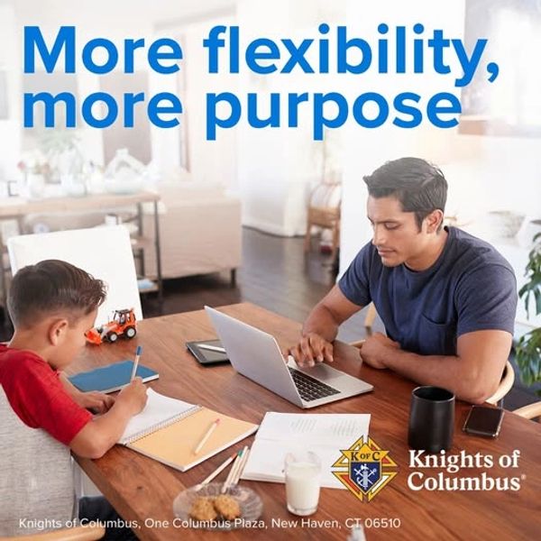 Father working on laptop while child studies at home.