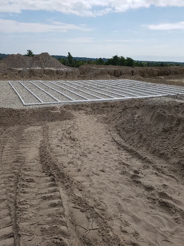 Piping and gravel in septic bed