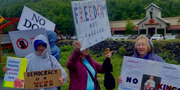 Some of our dedicated volunteers showing up rain or shine.