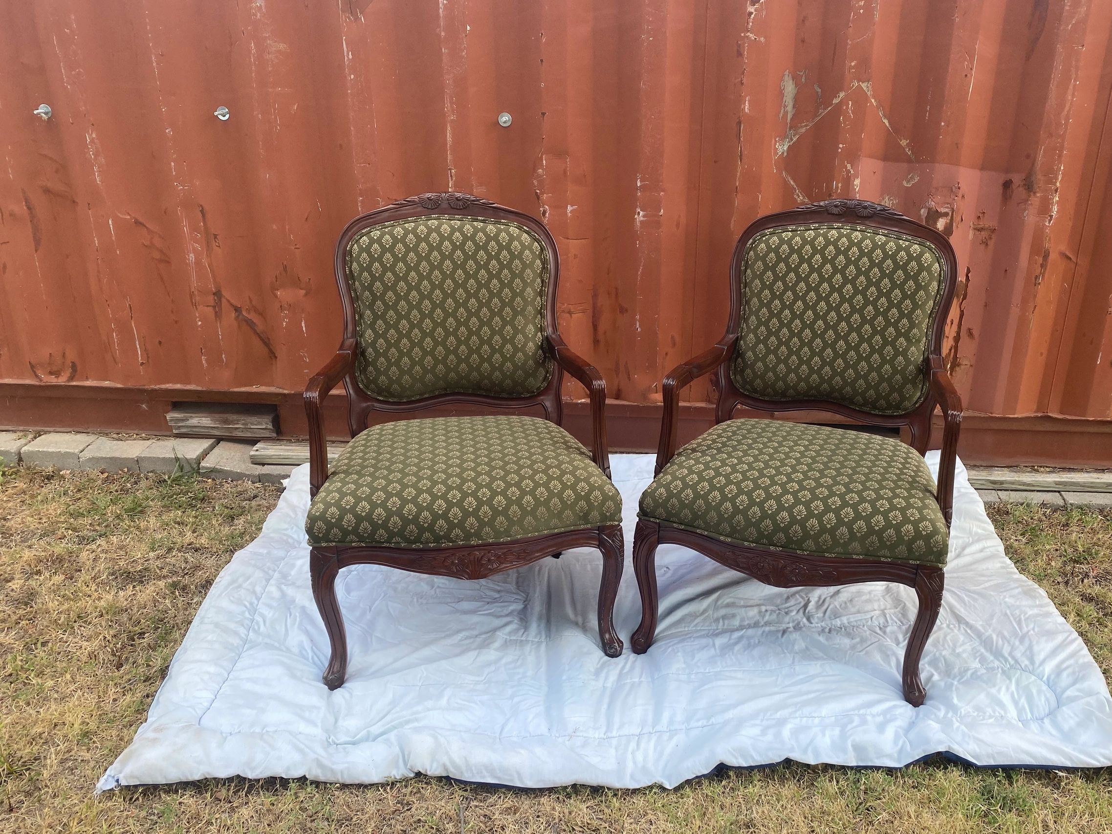 INV-001
(2) Brown chairs with green upholstery.   27 1/2 in. Wide by 38 in. High. We can change the 