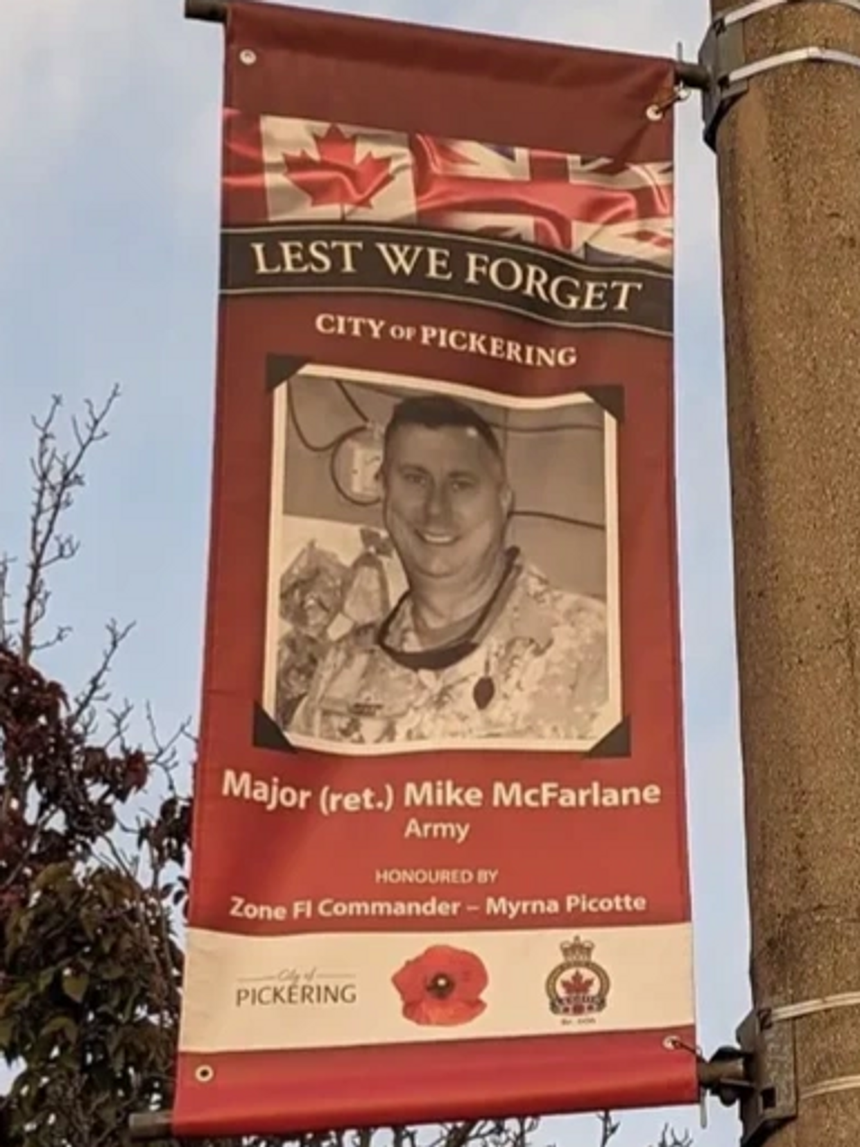 Memorial banner for Major (ret.) Mike McFarlane in Pickering.