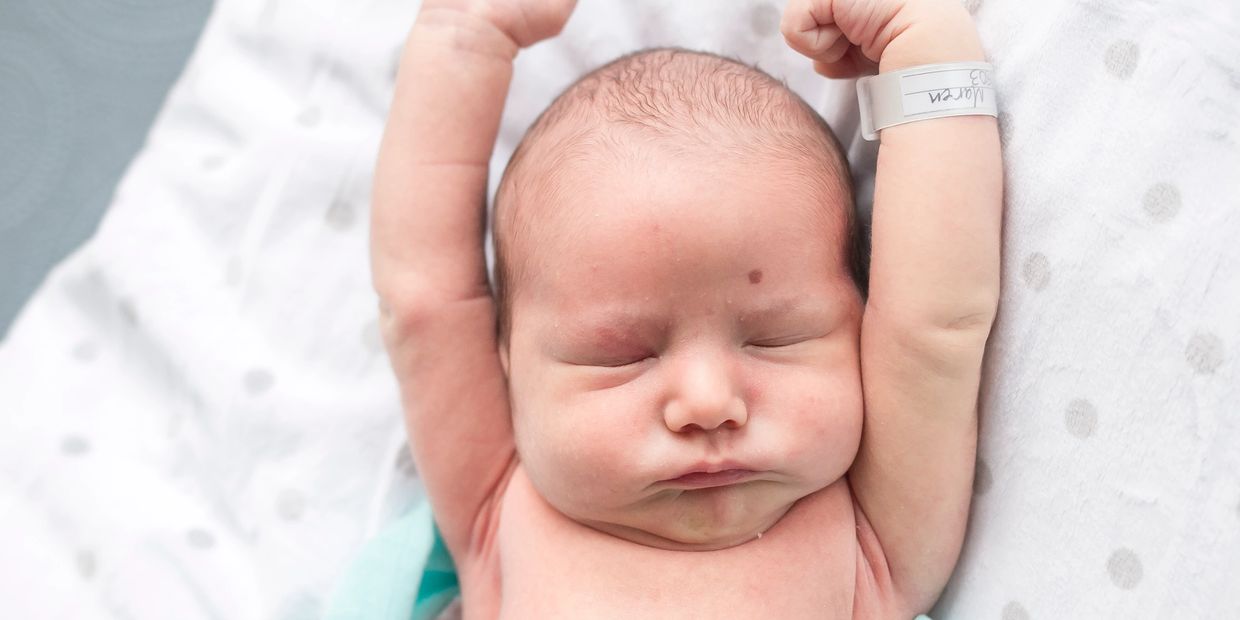 newborn baby stretching