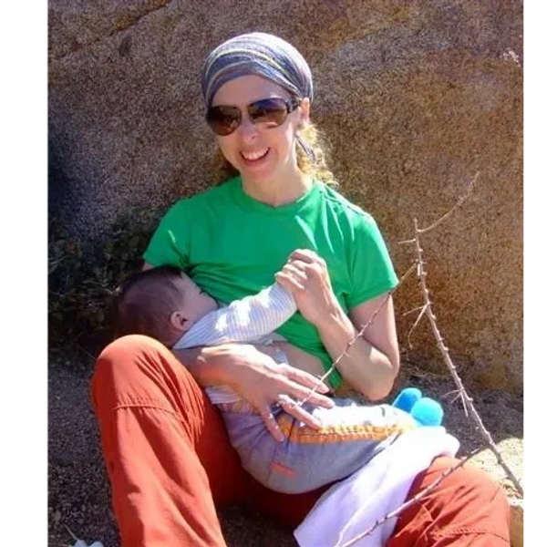 woman breastfeeding outside