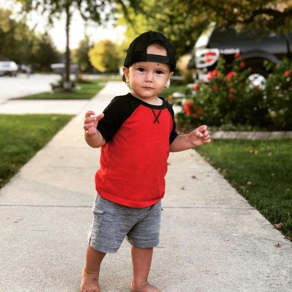 walking barefoot toddler boy