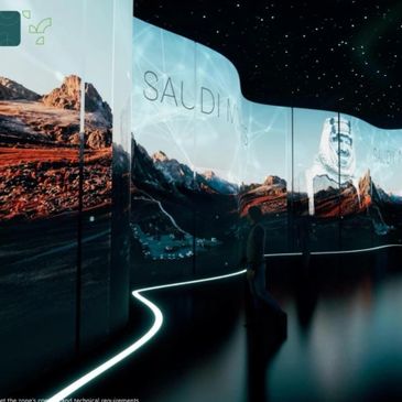 Immersive Saudi Arabia landscape exhibit with panoramic digital screens and starry ceiling.