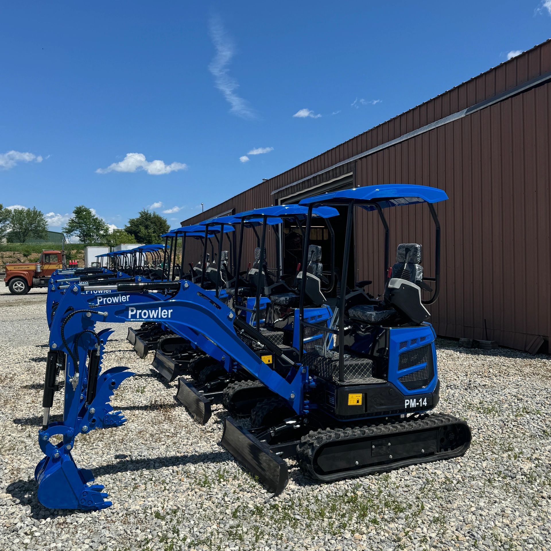 Prowler PM-14 Mini Excavators lined up side-by-side