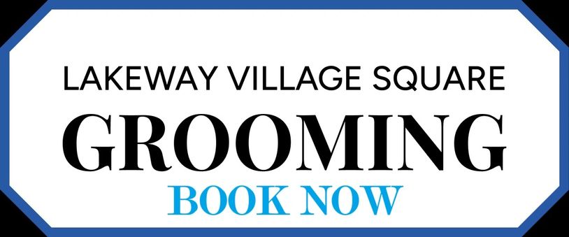 Sign for Lakeway Village Square grooming services, encouraging to book now.