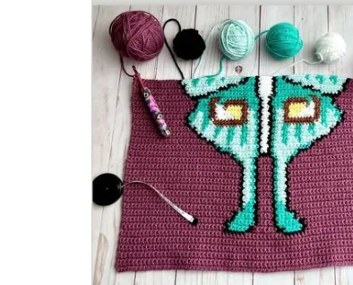 Fun image and crochet hook.