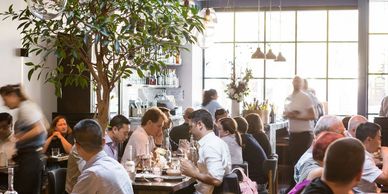 People eating in dining room.