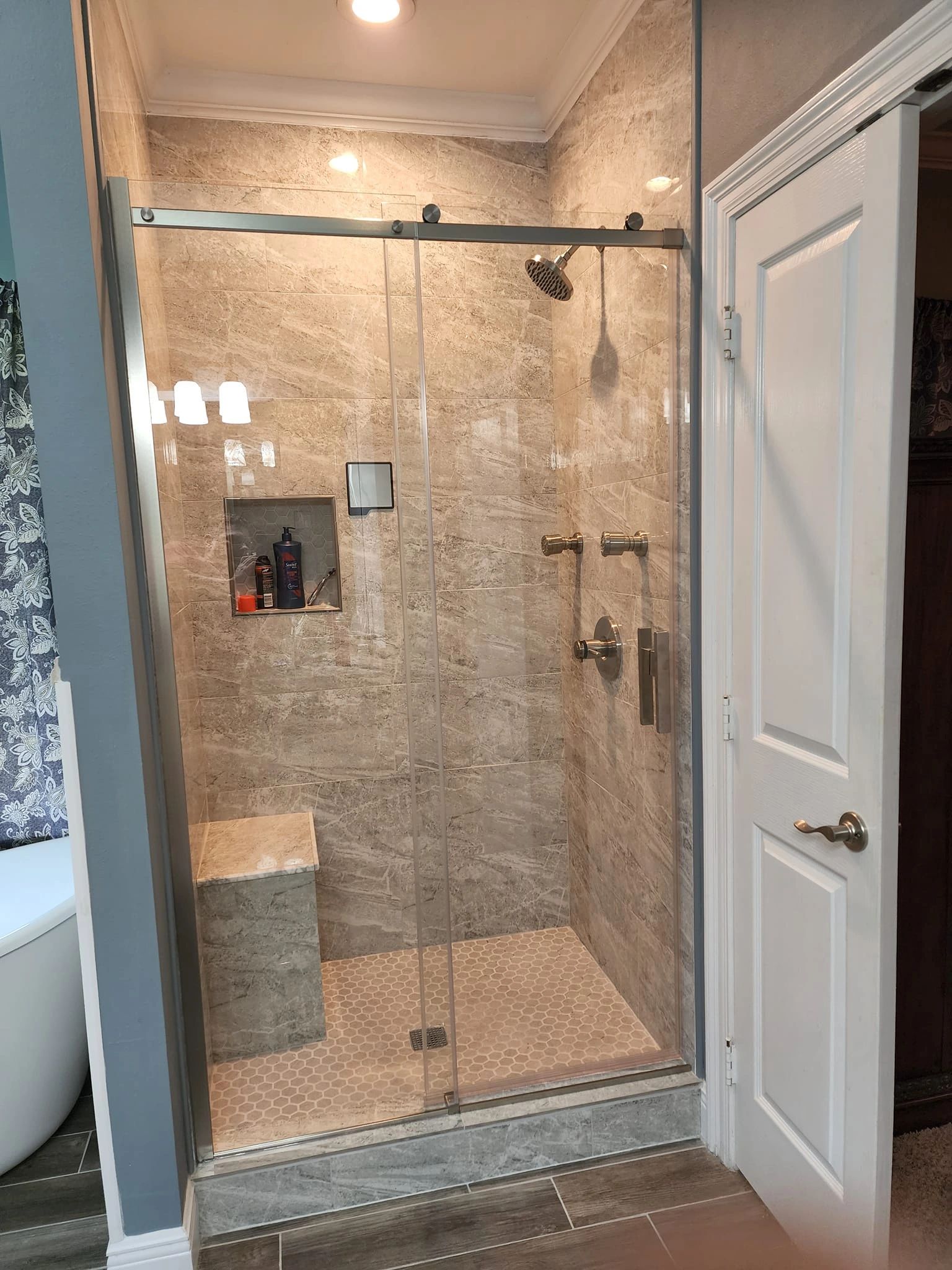 Frameless sliding shower door