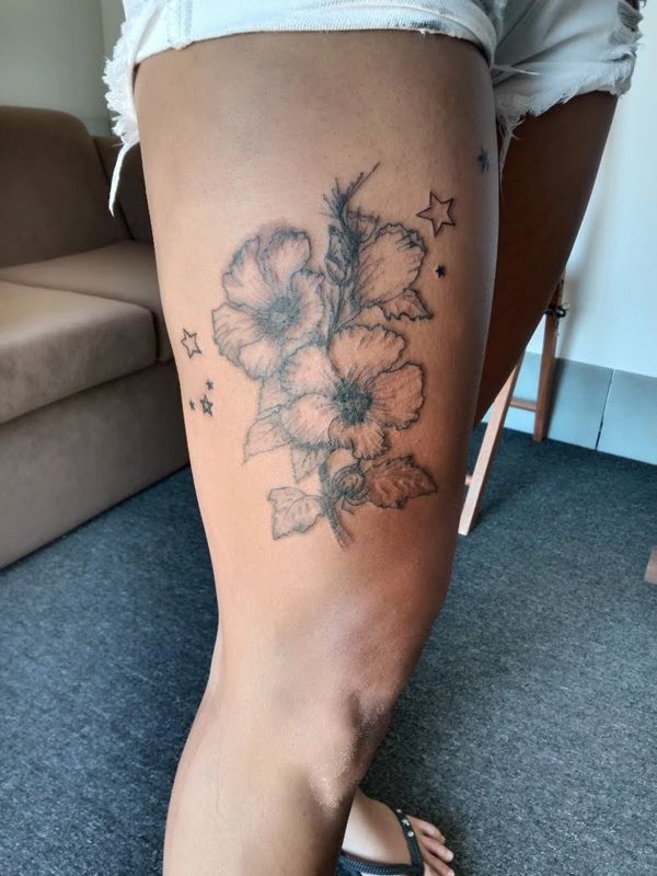 hibiscus thigh tattoo