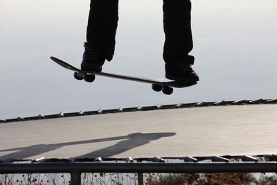 Trampoline skateboarding with Tramptrucks a skateboarding training device 