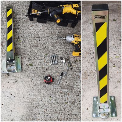 fold down bollard installation. tools on the ground. locksmith near me eprlocksmith
