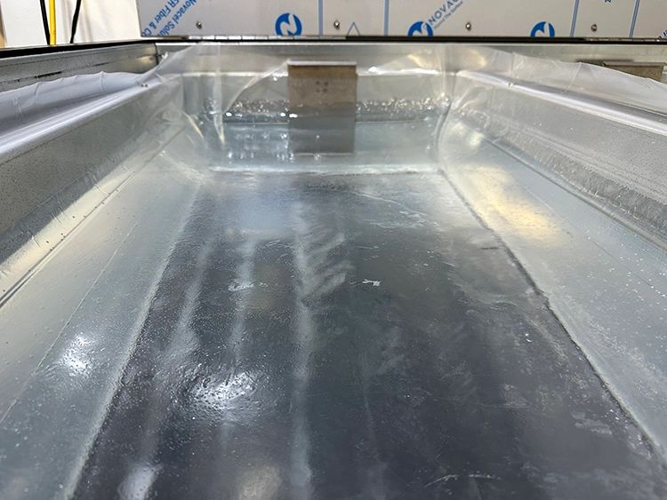 400lb ice cube ready to be processed into artisanal craft ice cubes and spheres