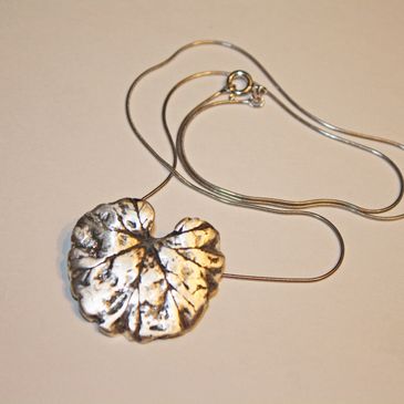 Precious metal clay (.999 fine silver) geranium leaf pendant in my handmade jewelry shop.