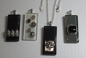Pendants made from glass or stone tiles.