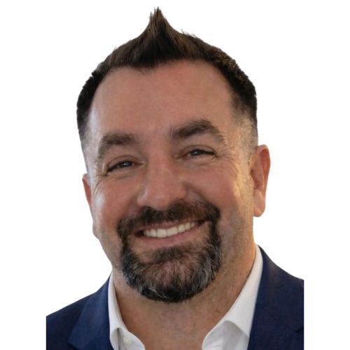 Joseph Smiling in a dress shirt