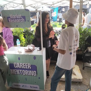 Career mentoring booth at a market research event.