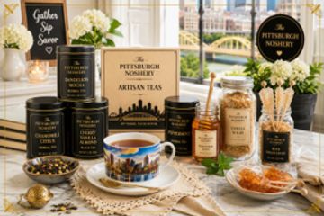 Elegant tea set with Pittsburgh Nosher products in a cozy setting.
