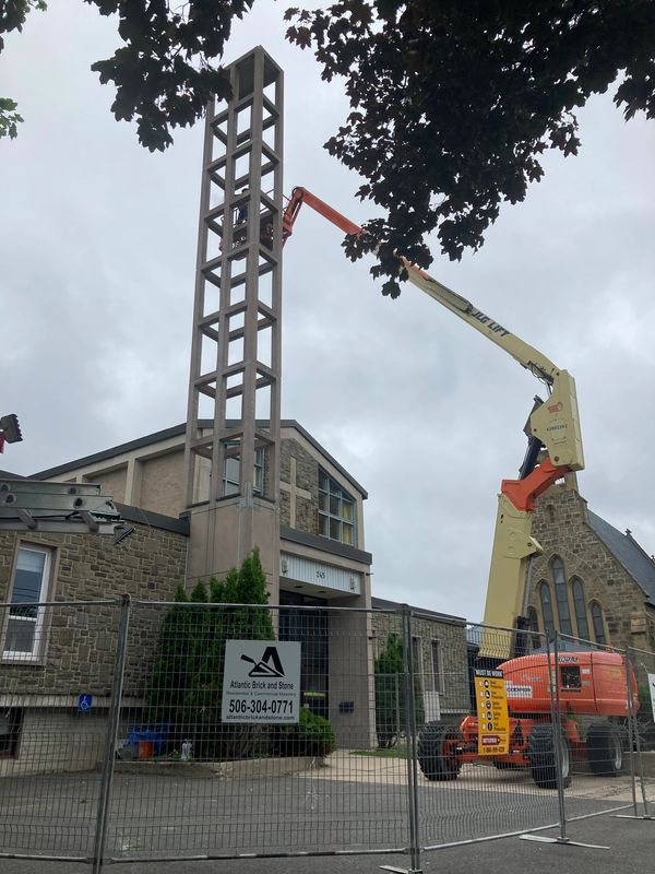 Sometimes fixing a cement steeple at a downtown church in Fredericton requires a little extra lift.
