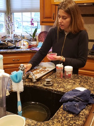 Cooking her favorite Italian desert to share with her American family and new friends.