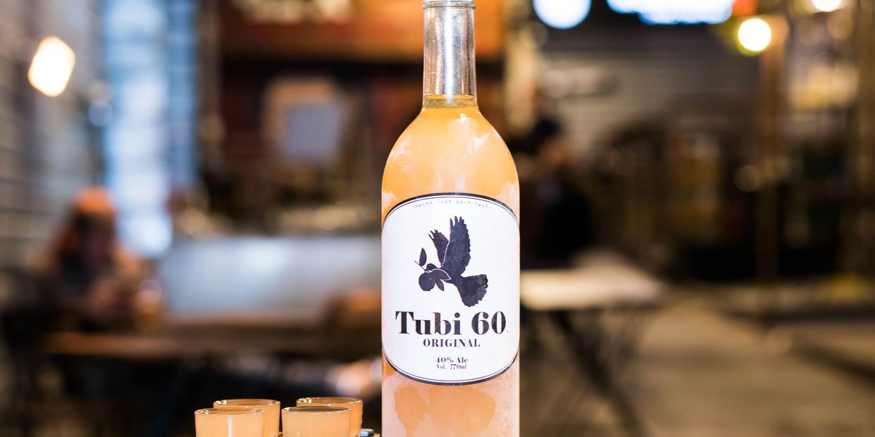 Tubi 60 bottle on a table