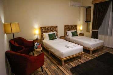 luxury and comfortable deluxe twin room at Dumani Nagar Hotel & Resort