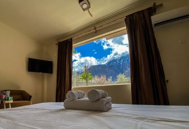 beautiful view of Rakaposhi from the room window of Dumani Nagar Hotel & Resort