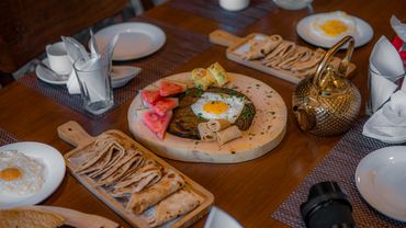 breakfast served in traditional style at the Gorkon Restaurant of Dumani Nagar Hotel & Resort