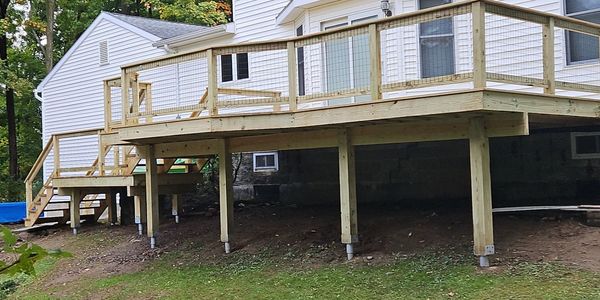 helical pile helical pier deck additions construction www.elitieroofingandconstructionllc.com 