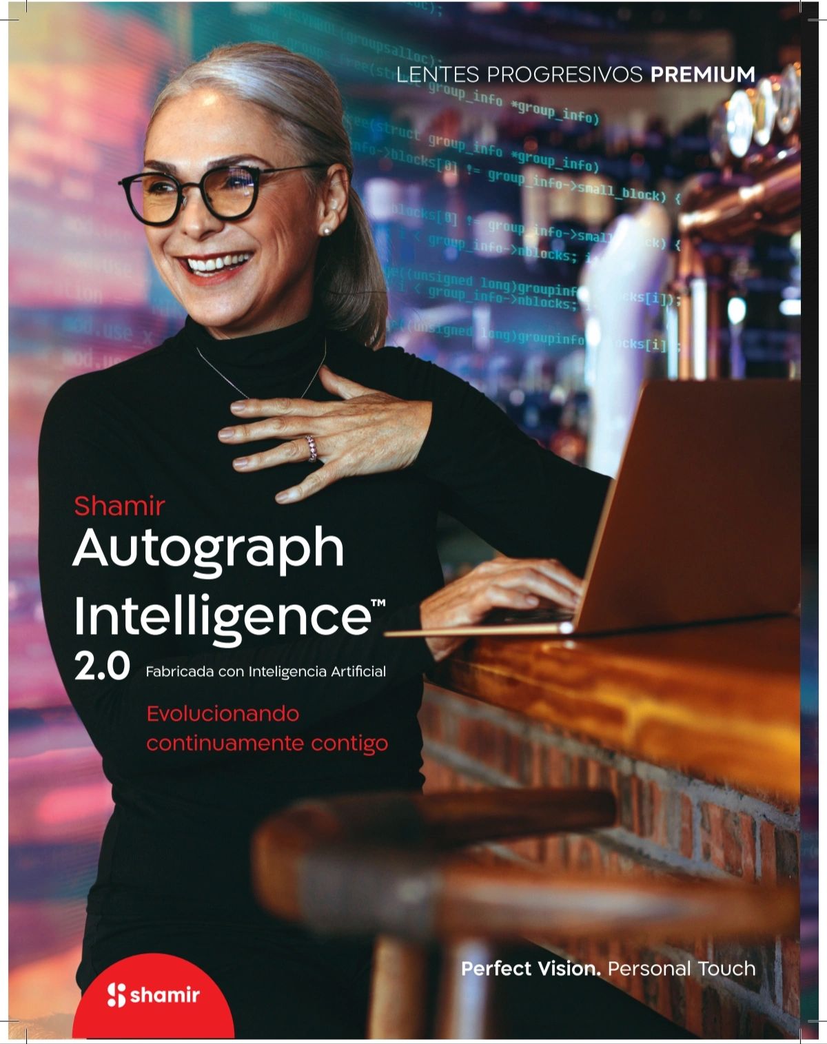 Mature woman wearing stylish glasses, smiling while working on a laptop in a cozy setting.