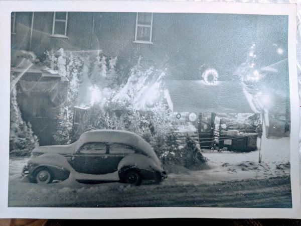 vintage car snow covered newsstand and Christmas tree stand 17t & Passyunk South Philly