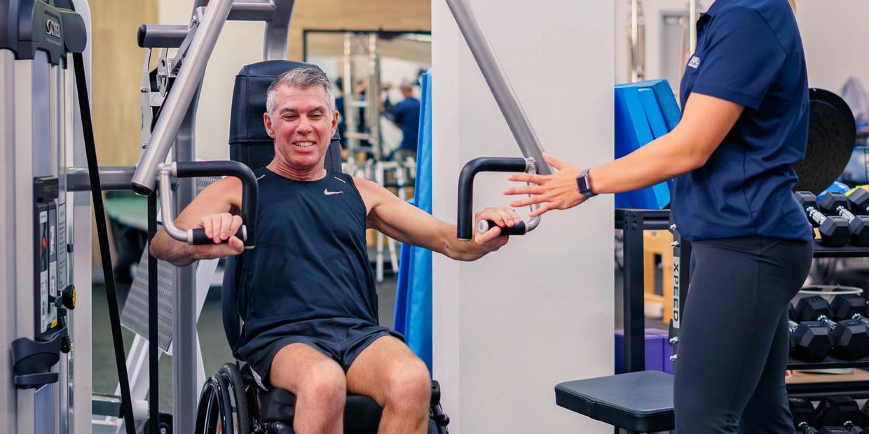 Man in wheelchair exercise accessible gym Adelaide
