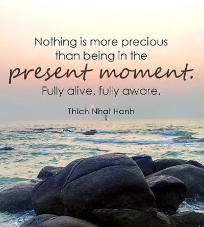 Inspirational quote about living in the present moment by Thich Nhat Hanh.