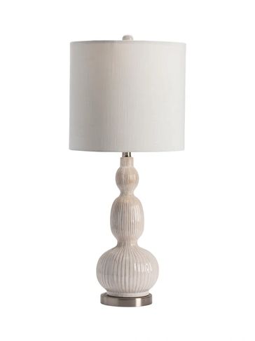 The Crestview Collection Solano Table Lamp combines transitional and coastal styles to give you a ve