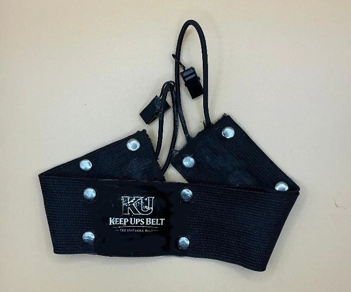 Black elastic Keep Ups Belt with metal snaps and adjustable straps.