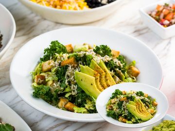 BKLYN Wild Brussels Sprout Caesar with Brussels sprouts, kale, avocado, croutons, and parmesan.