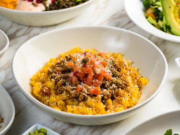 BKLYN Wild Veggie Mac bowl with pasta twists, vegan cheese sauce, black bean chorizo chili, pico.