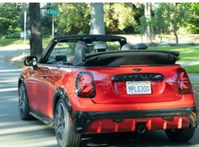 Red MINI Cooper Convertible with the top down, perfect for island driving on Oahu