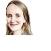 Portrait of a smiling woman with light hair against a transparent background.