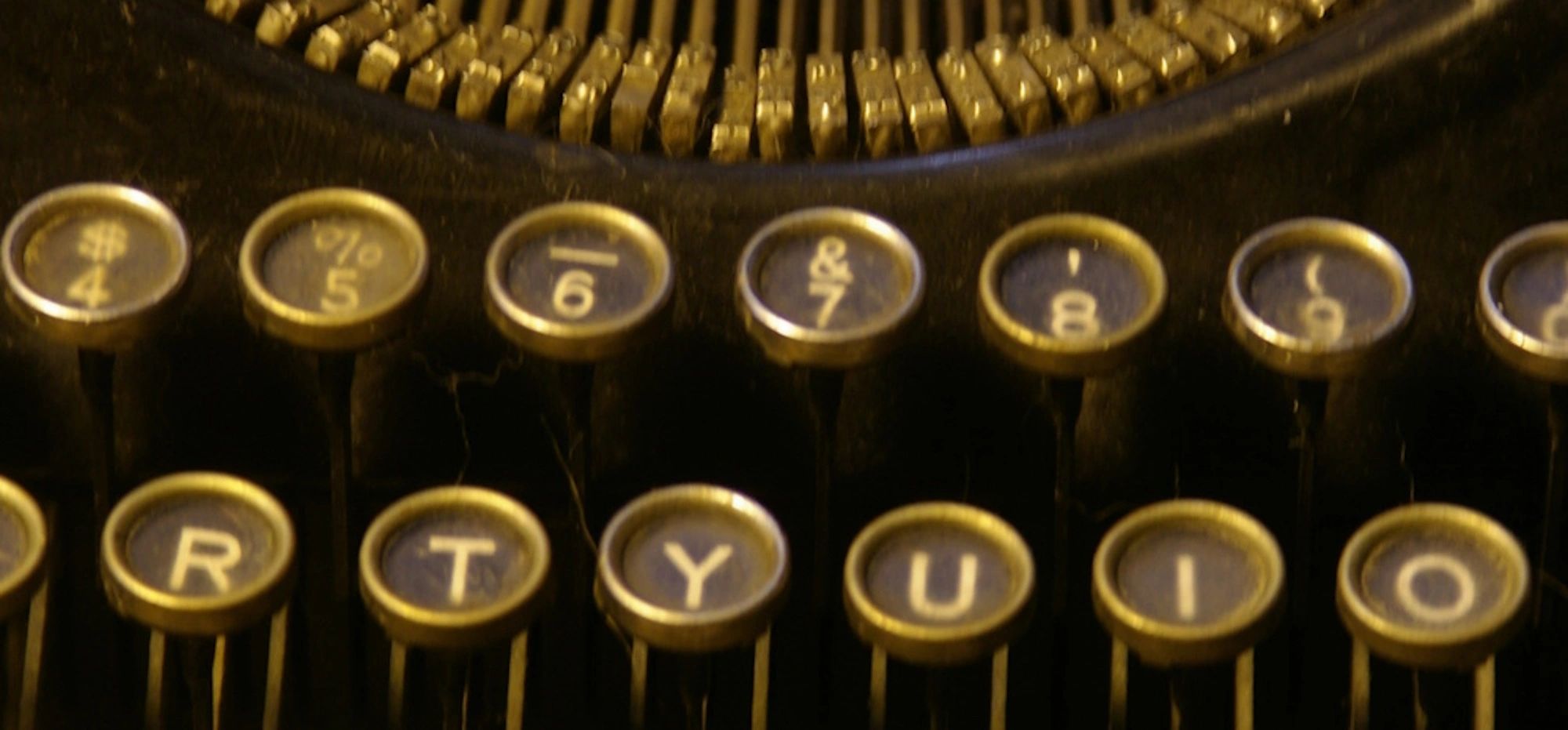 Old-fashioned typewriter keyboard. Closeup of selected area.