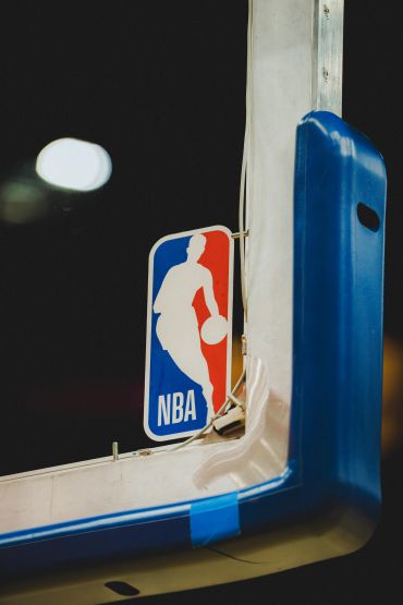 NBA logo on a basketball hoop.