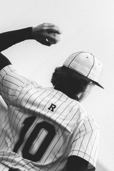 Baseball player preparing to throw the ball.
