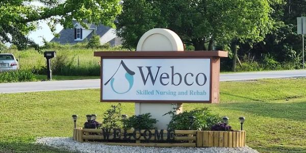 Sign for Webco Skilled Nursing and Rehab in a grassy area.