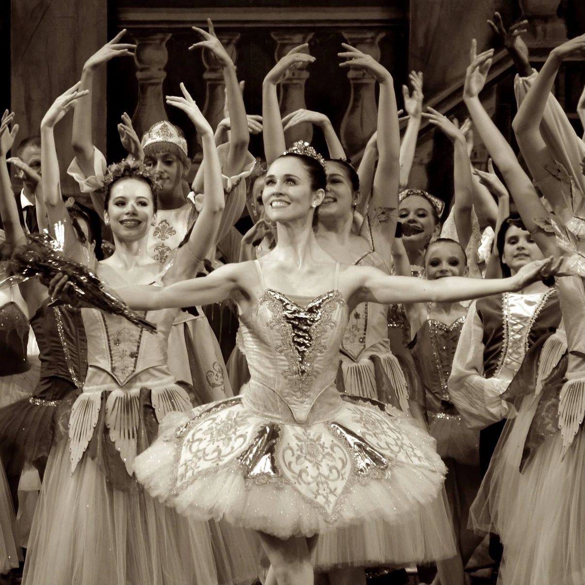 Ballet dancers in elegant costumes during a performance.
